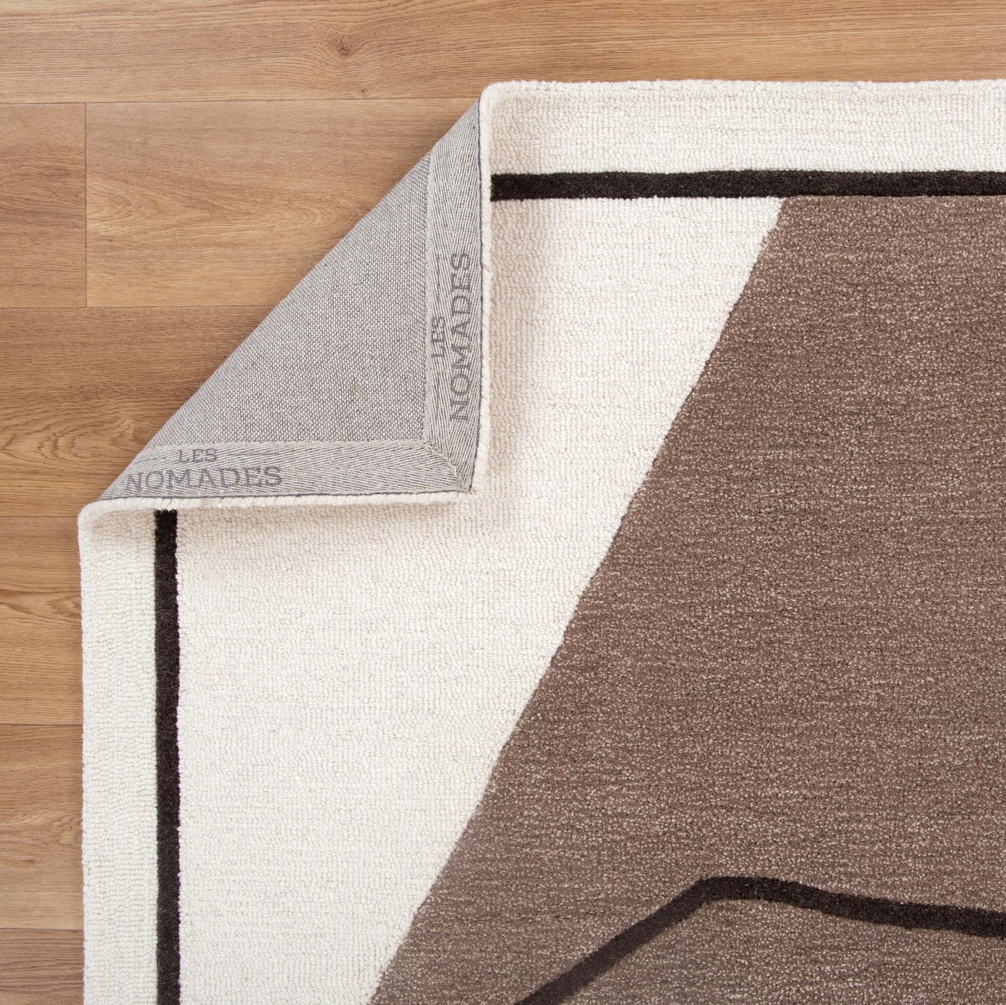 Les Nomades Minimal Beige Wool Rug